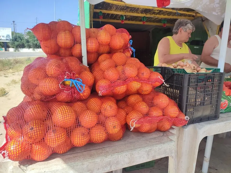 7. Compra de naranjas